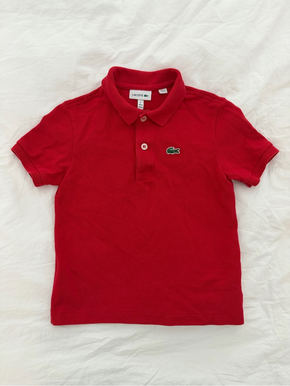 Boys red Lacoste polo shirt  age 6